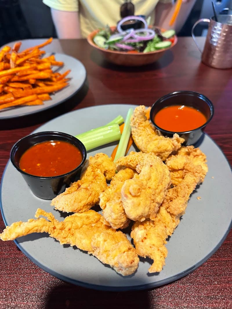 Interior view of The G.O.A.T Sports Bar and Grill bowling alley